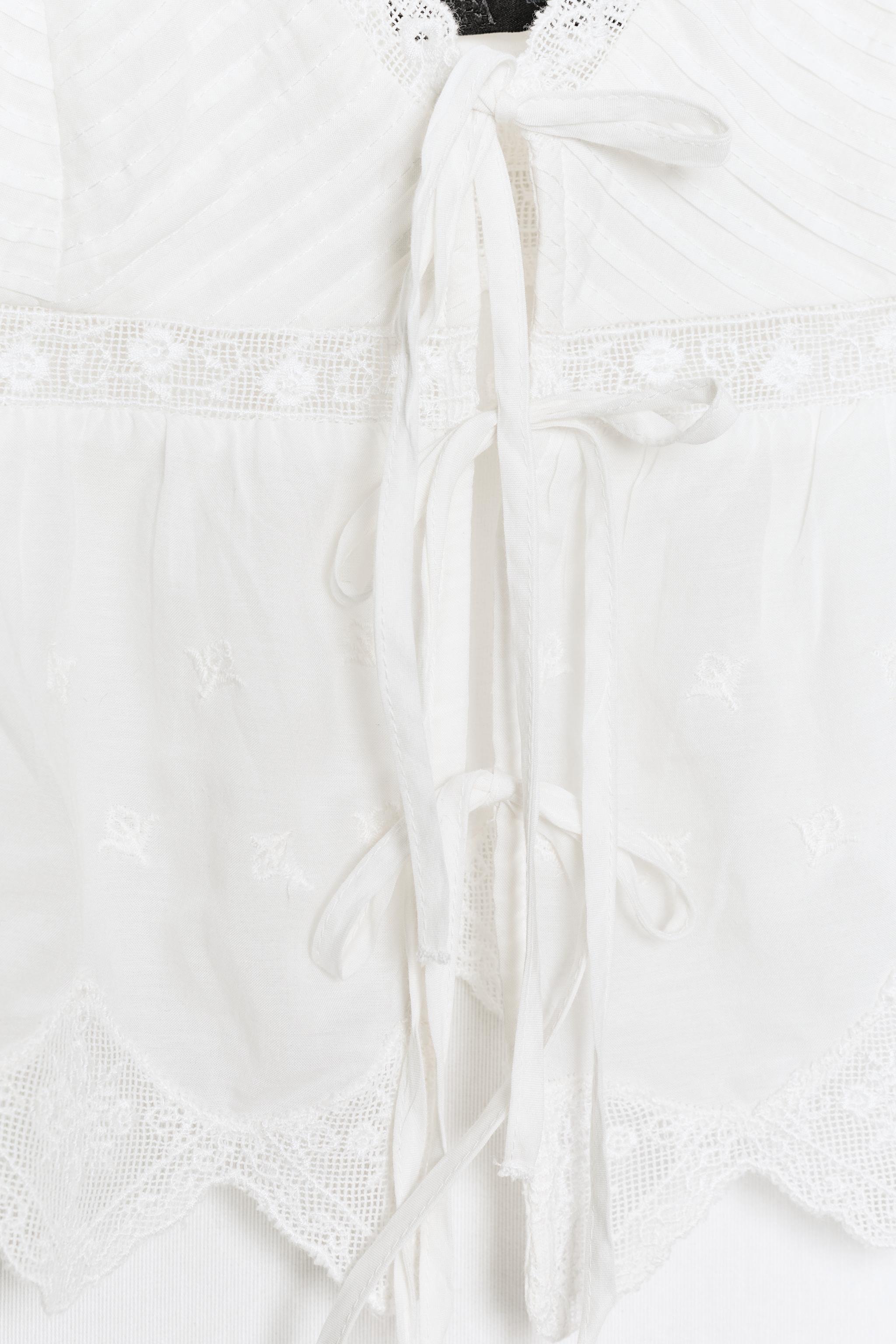 EMBROIDERED TIE-FRONT CAMISOLE